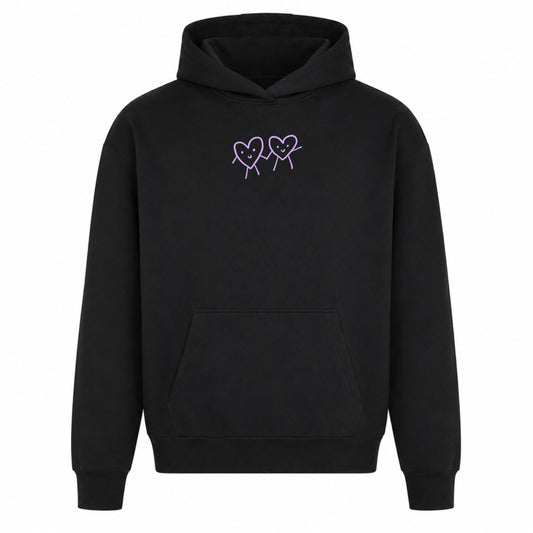     Schwarzer Statement Hoodie von vorn mit kleinem Brustmotiv